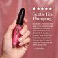 Luminess Gentle Lip Plumper held in hand with product information about a gradual lip-plumping effect and glossy-looking lips image number null