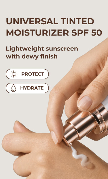 Woman holding Luminess Color Adjusting Tinted Moisturizer SPF Kit featuring lightweight coverage, long-lasting hydration, hyaluronic acid, vitamin E, hydrolyzed silk, and 18-hour wear.